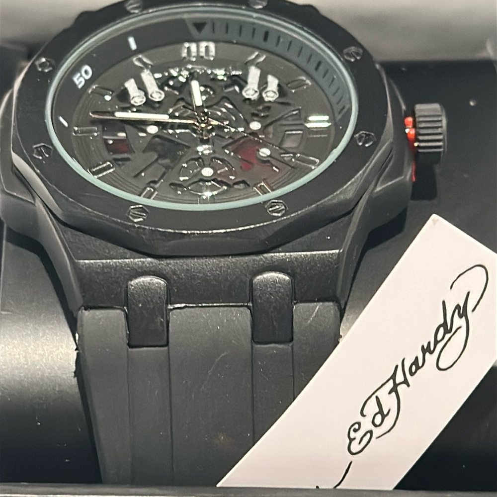 New in Box Ed Hardy Men’s Black Face Watch with Hour, Minute and Second hands.
